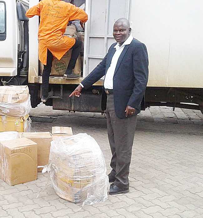 Receiving Donation of Laptops for School Computer Laboratory